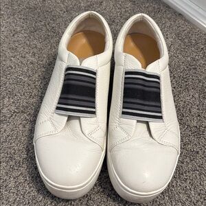 White Slip-On Sneakers with Black Stripes
